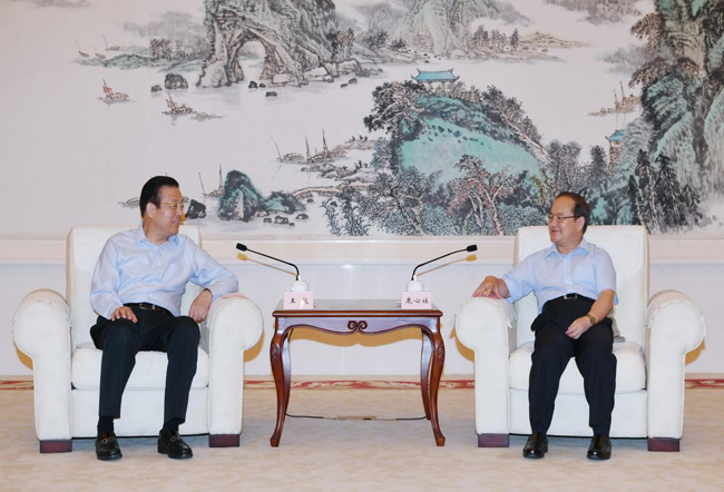 王毅董事長出席中國信保與廣西自治區政府深化合作簽約暨廣西分公司成立儀式