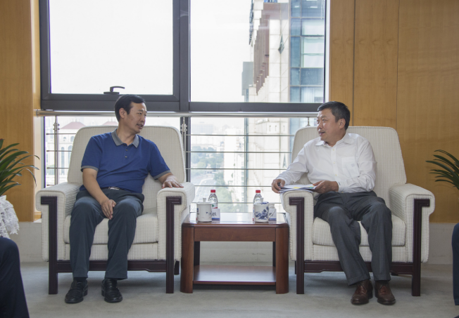 周立群監事長會見中國信保定點扶貧縣安徽霍邱縣縣委書記劉勝